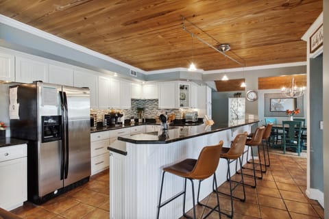 Stainless steel appliances. Bar seating for 4. 
