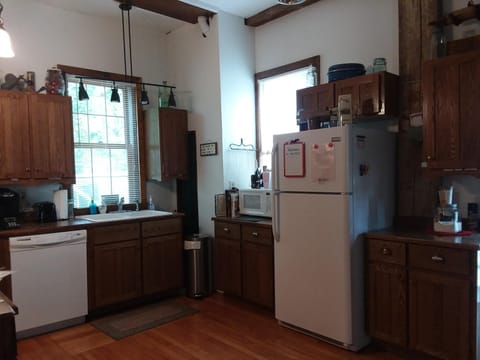 Open kitchen. Stove is out of picture to left as you look at photo.