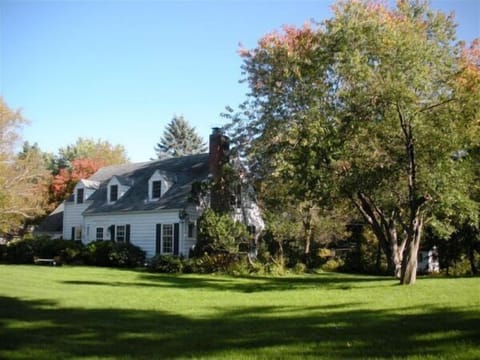 Minnetonka Cape Cod Charmer from west with fall colors