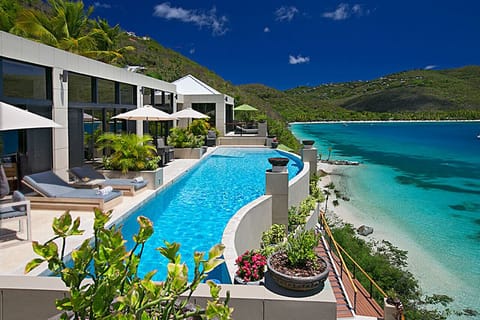 A view of the pool deck, with Magen`s Bay Beach in the background.