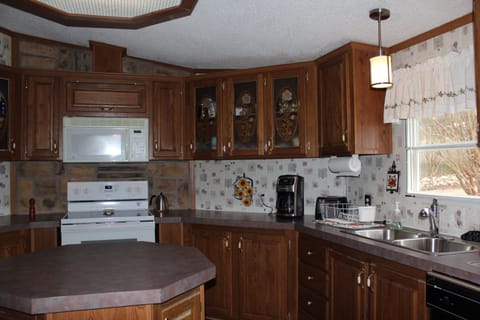 Kitchen equipped with lots of extras