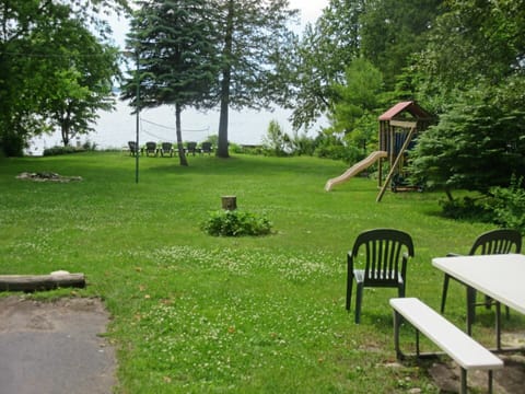 Standing at the walk to the cottage door, the view to the bay.