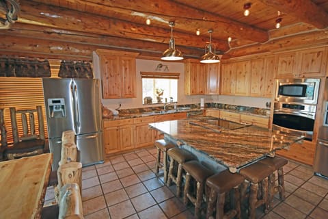 2 Refrig, 2 ovens, pantry, lg sink, lots of counter space, dishwasher & views.