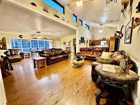Open concept- living room, game room, and kitchen -pool table bar poker table TV