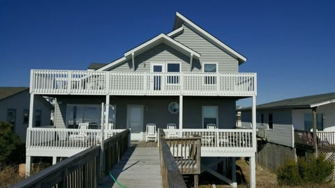 The ocean side porch with lots of seating.