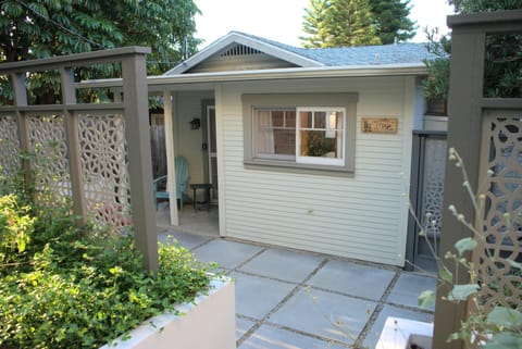 Exterior of the cottage from the stairs.