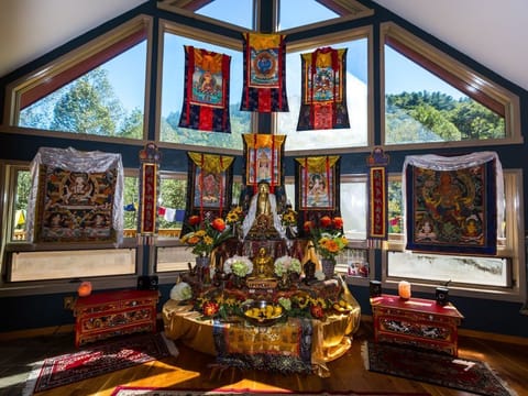 Pristine views of the forest in the windows of the Altar Room as you sit present