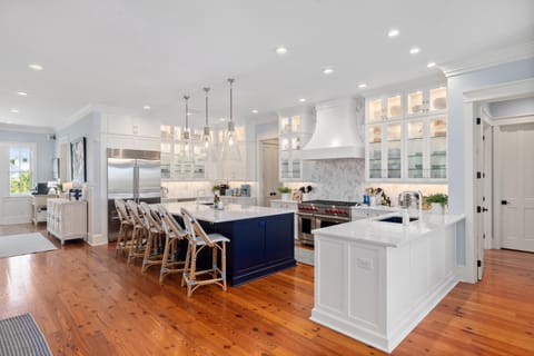 Kitchen with 48" Wolf range, 48" Subzero fridge, 2 dishwashers and convec micro