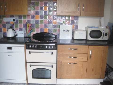 Well equipped kitchen diner with seating for six.