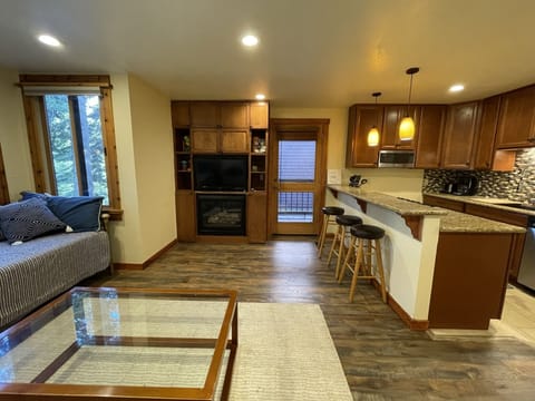 Living room and breakfast bar area