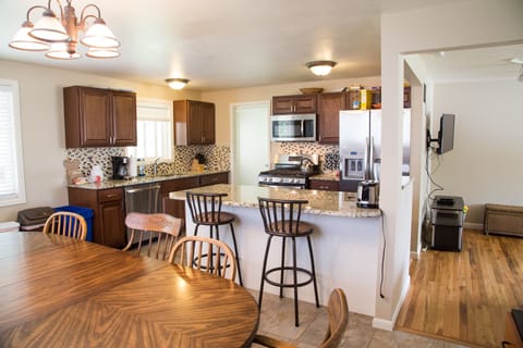 Kitchen dining room and living room are all open to each other