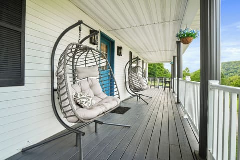 Relax Together in Double Seat Eggshell Swing