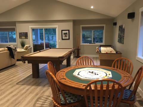 The room that has it all, pooltable, ping pong,shuffleboard, poker table, tv