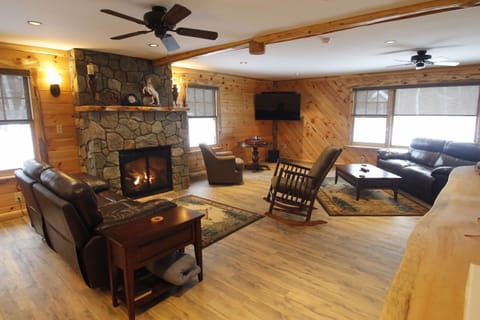 Spacious living room with full screen smart TV