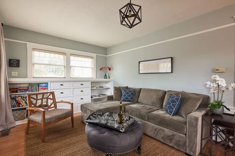 The warm and cozy living room is a perfect place to relax and kick back and enjoy wine and watch 4000+ channels on TV and free internet.