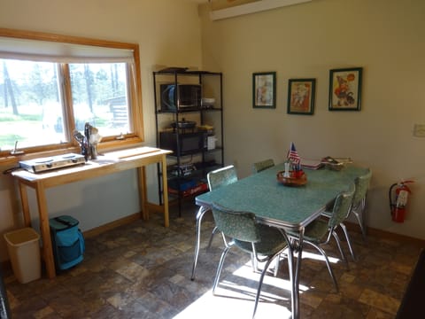 Seating for 4 at antique table from my family farm.