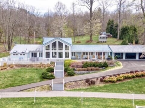 The Blue Heron Getaway.  Owners live in the center main house. Apt is on the Rt