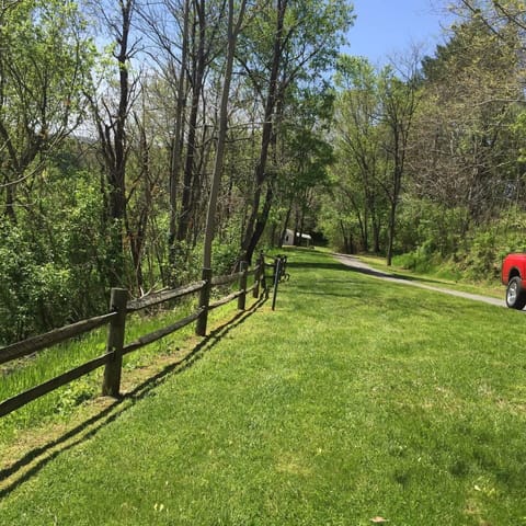 VIEW FRON FRONT PORCH DOWN DRIVEWAY...