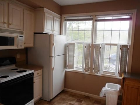 Modern Kitchen with Tile Floors. 