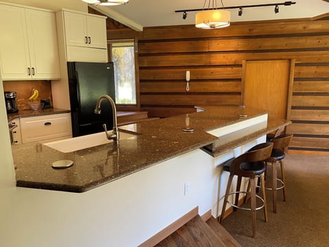 Bar seating with pop up power and charging stations