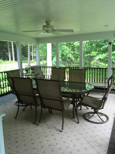 SCREENED PORCH WITH BBQ RIGHT OUT THE DOOR AND OFF THE KITCHEN