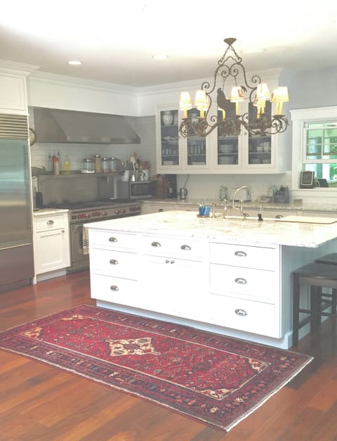 KITCHEN WITH 60" WOLF RANGE AND SUBZERO REFIGERATOR/FREEZER