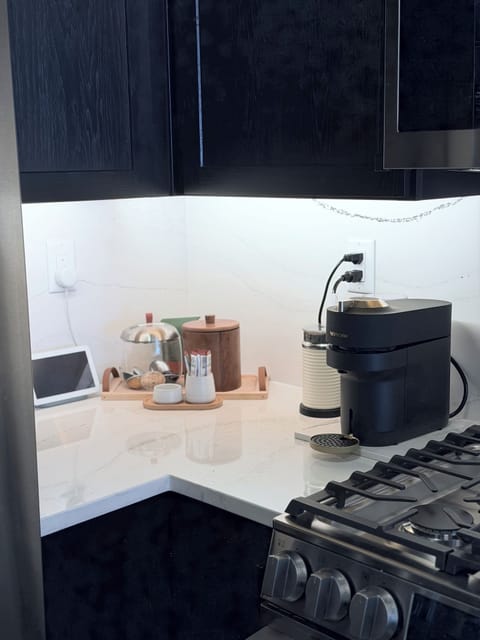 Coffee bar area - Nespresso Vurtuo Machine. Please bring pods.