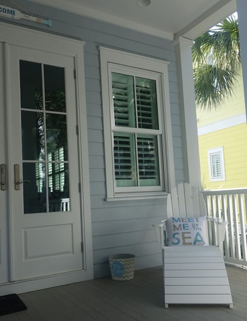 Relax on the front porch with matching Adirondack chairs