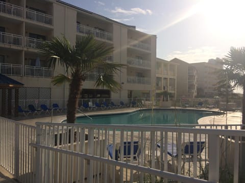 Captivating beachfront property showing 1 of 4 welcoming  pools.