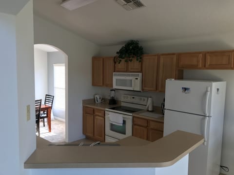 Prepare meals in the fully equipped family kitchen