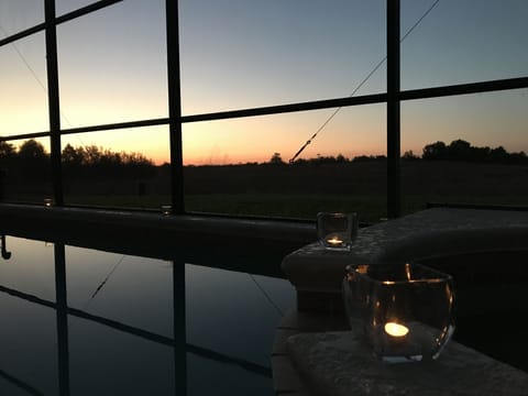 Watch the sunset over your pool.