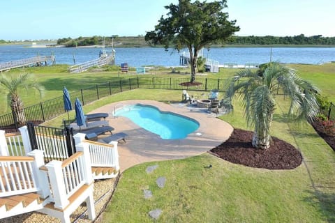Beautiful private pool, fire pit, and private pier
