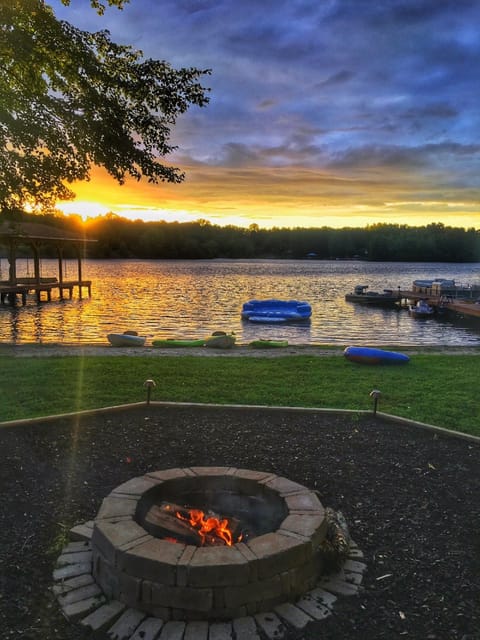 beautiful sunset over the water at the fire pit -float, boathouse not included 
