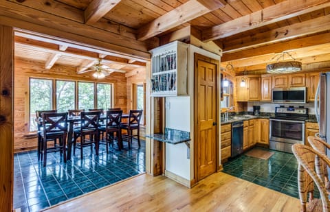 Full Kitchen (utensils, plates, cookware) with granite counter tops.