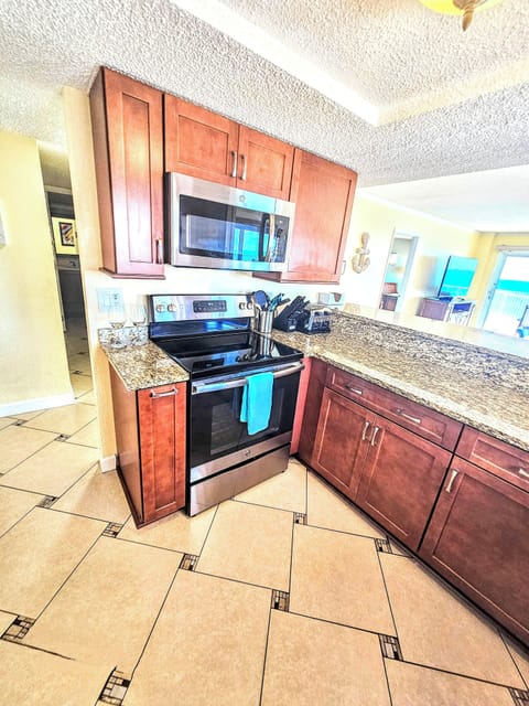 Fully stocked granite kitchen.Newer appliances.Pots, pans, dishes and utensils.