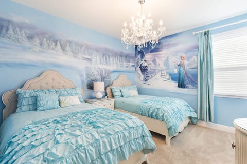 2 full size beds in our Frozen room with a bathroom