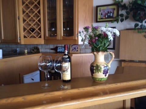 Bar, upper level adjacent to kitchen