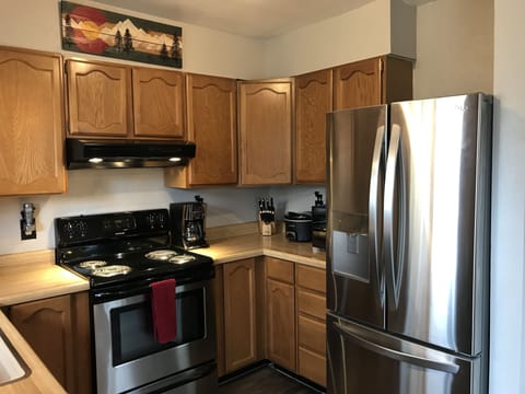 Fridge with water and ice dispenser.