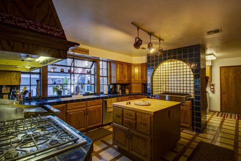 Kitchen with two refrigs, indoor BBQ, griddle, cooktop, dbl oven, and 2 sinks!
