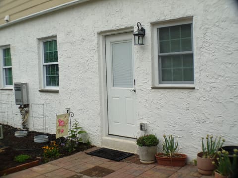 First-Floor Apartment entrance.  No stairs to climb.  Nice little garden.  
