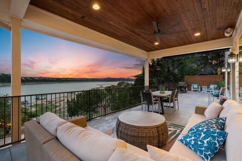 Lake house has incredible outdoor living , dinning and grilling areas with sunset and sunrise views of Lake of Travis.
