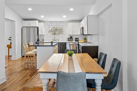 Spend time with family and friends around the spacious table and kitchen island