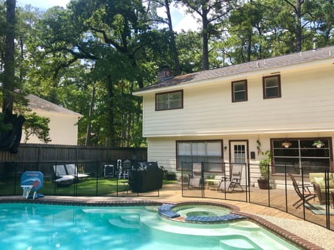 Saltwater pool with hot tub. Very private back yard.