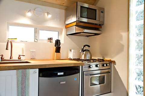 There is a full kitchen