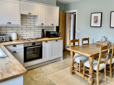 Modern kitchen with dining table