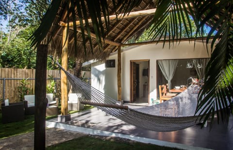 A big private garden with a kitchenette and a sitting area. 