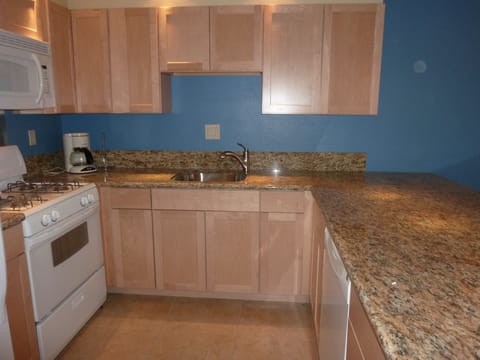 Kitchen.  With new appliances, cupboards and granite counter.  