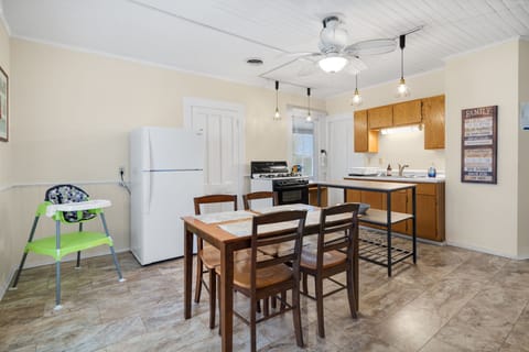 Large  kitchen in this beautifully remodeled home. Vinyl floor, double windows. 