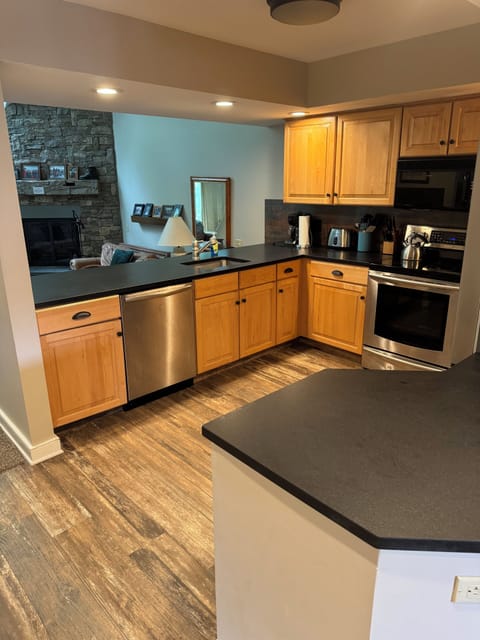 Kitchen redone with new appliances, refrigerator, stove and dishwasher