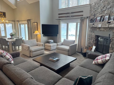 New living room furniture January of 2026. Sectional sofa. Smart TV.